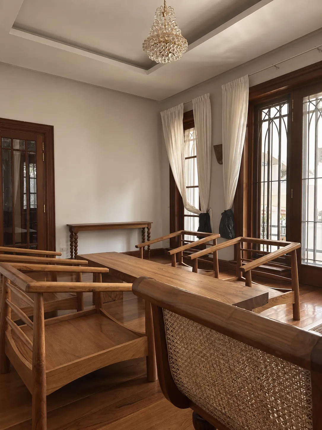 Teak and cane armchairs